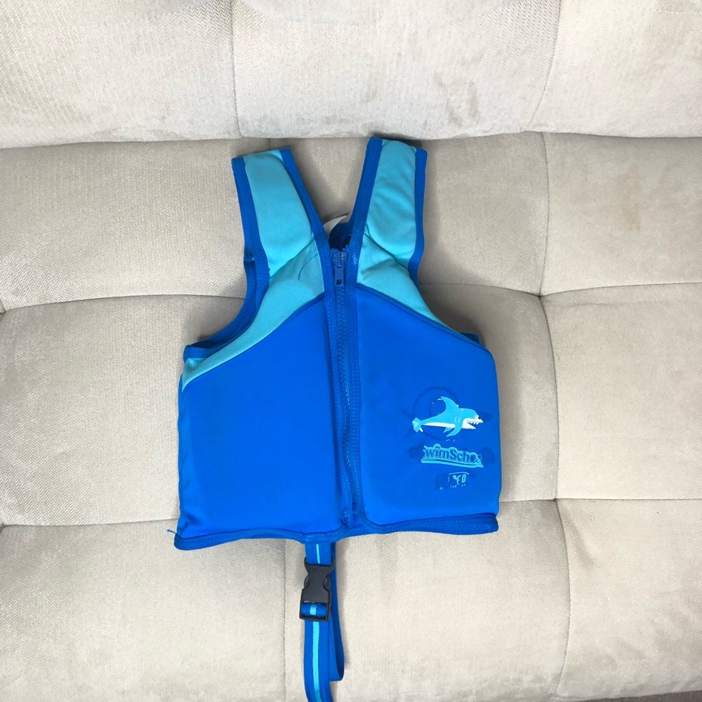 Infant Swim Vest - Blue with safety belt between legs.